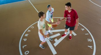 Airy campers playing basketball