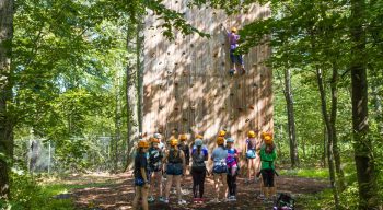 Louise campers on climbing wall