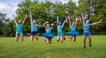 Campers jumping during color war