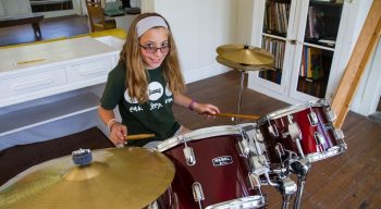 Louise camper playing the drums