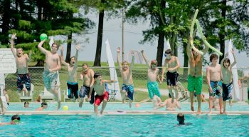 Airy boys jumping into pool