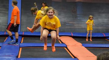 Girls bouncing at trampoline park