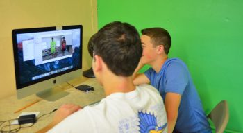 Campers learning video production